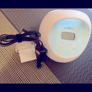 Spectra pump with wall charger and car charger